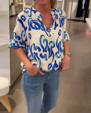 Elegancka bluzka z długim rękawem i dekoltem w kształcie litery V