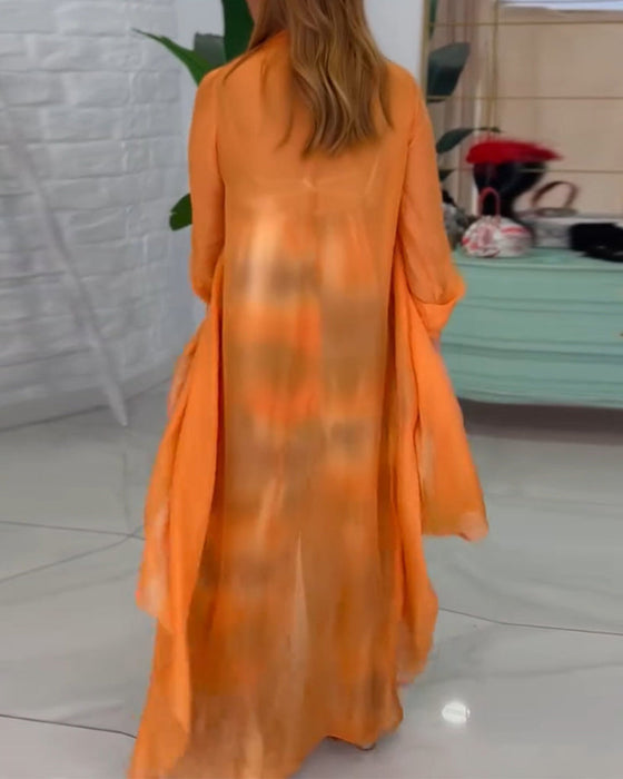 Zestaw kombinezon i kardigan o eleganckim i modnym stylu