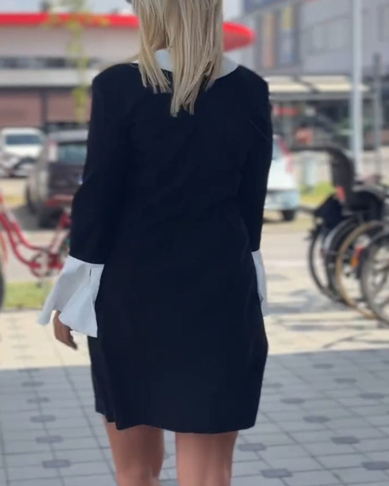 Elegancka kontrastująca sukienka z rękawami dzwonkowymi