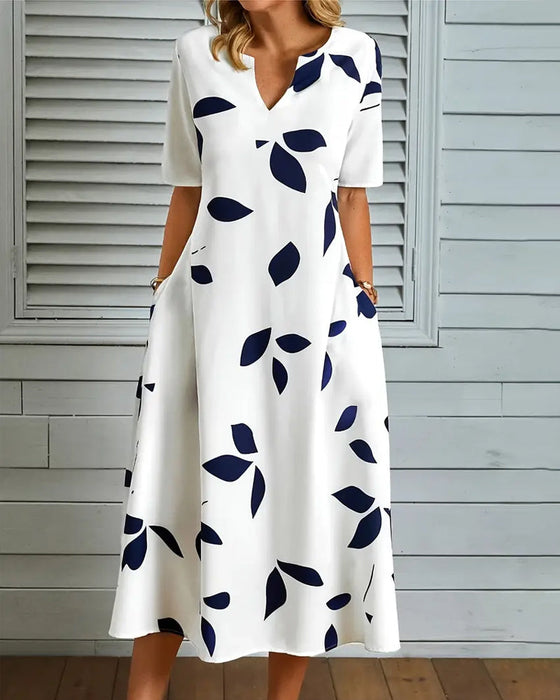 Sukienka z krótkim rękawem i kwiatowym dekoltem V