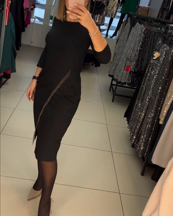 Rozcięta sukienka z okrągłym dekoltem