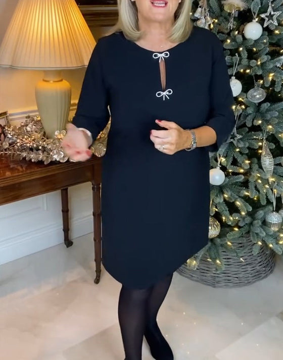 Prosta sukienka w jednolitym kolorze z okrągłym dekoltem