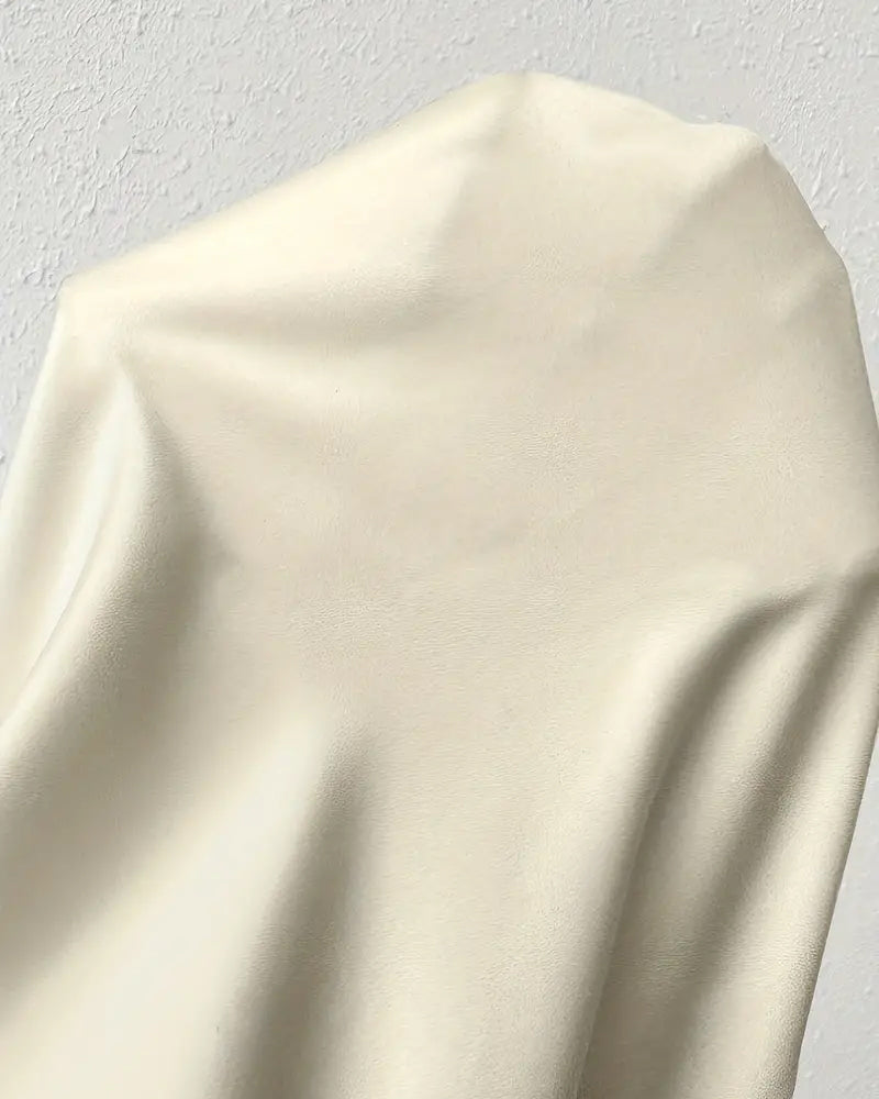 Swobodna jednokolorowa plisowana bluzka z długim rękawem