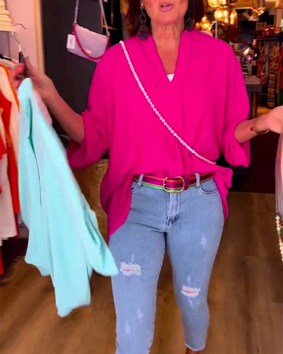 Bluzka w jednolitym kolorze z dekoltem w kształcie litery V i rękawami trzy czwarte