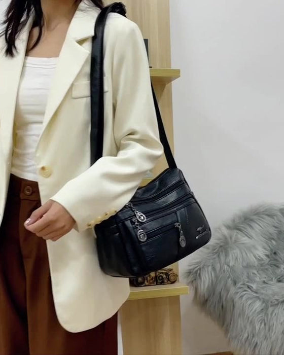 Wielokieszeniowa miękka skórzana torebka na ramię (crossbody)