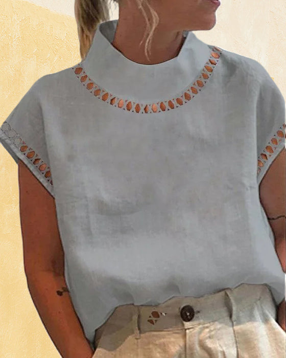 Bluzka ze stójką z koronki w jednolitym kolorze