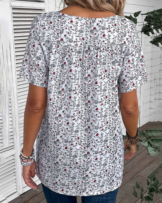 Bluzka z falbanką w kwiatowy wzór