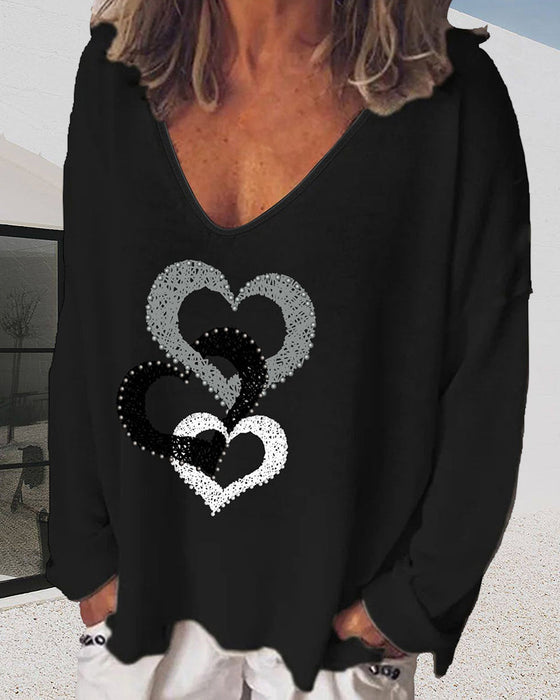 Bluzka z długim rękawem i nadrukiem serca