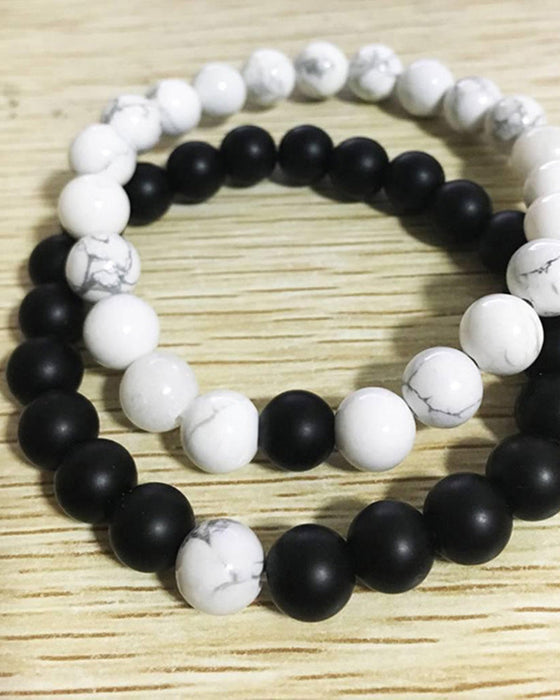 Zestaw bransoletek dla par z czarno-białych koralików