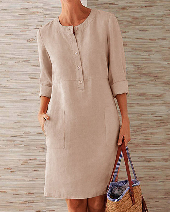 Jednolita sukienka do kolan z okrągłym dekoltem