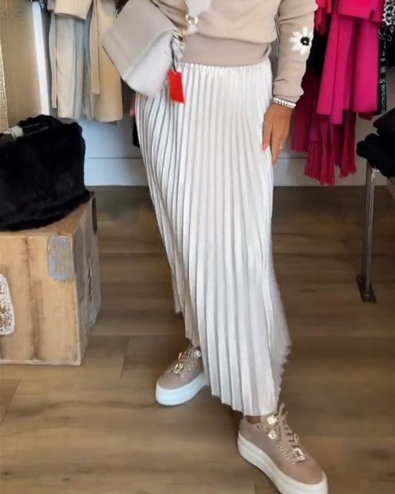 Plisowana sukienka w jednolitym kolorze