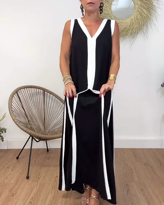 Modna sukienka bez rękawów z kontrastowym nadrukiem i dekoltem w kształcie litery V