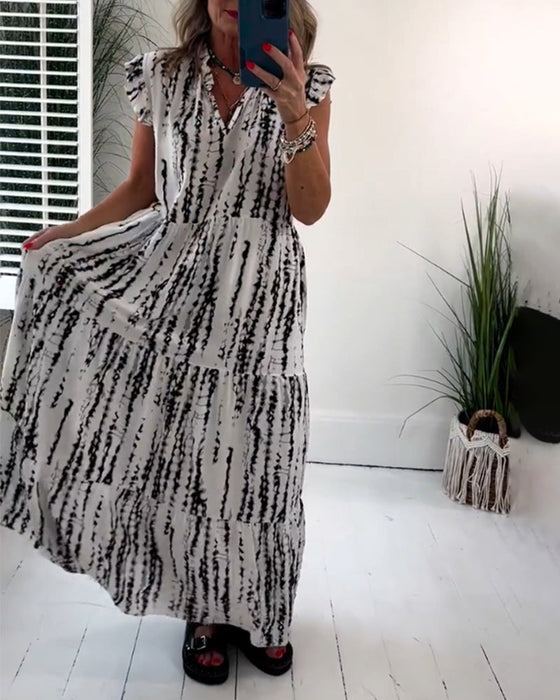 Sukienka z dekoltem w serek i nadrukiem