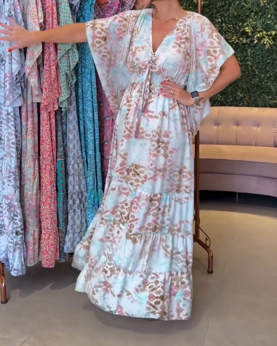 Długa sukienka z nadrukiem w kształcie litery V z rękawami