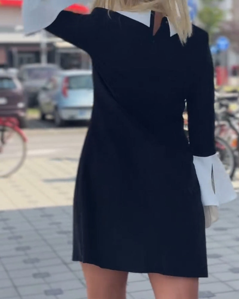 Elegancka kontrastująca sukienka z rękawami dzwonkowymi