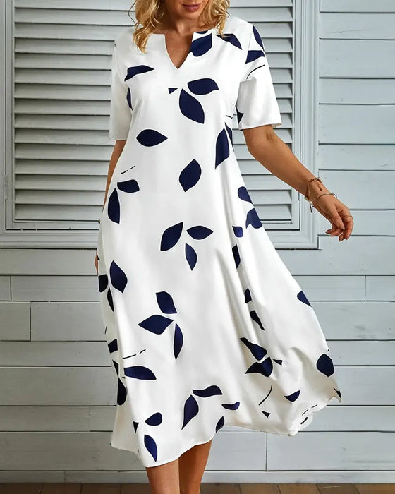 Sukienka z krótkim rękawem i kwiatowym dekoltem V