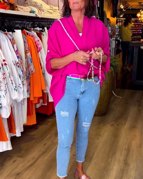 Bluzka w jednolitym kolorze z dekoltem w kształcie litery V i rękawami trzy czwarte