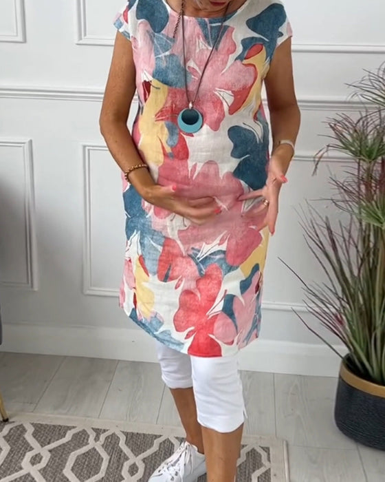 Długa bluzka w kolorowe kwiatowe wzory