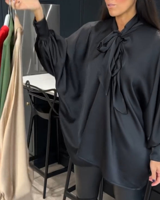 Bluzka w jednolitym kolorze z kokardą