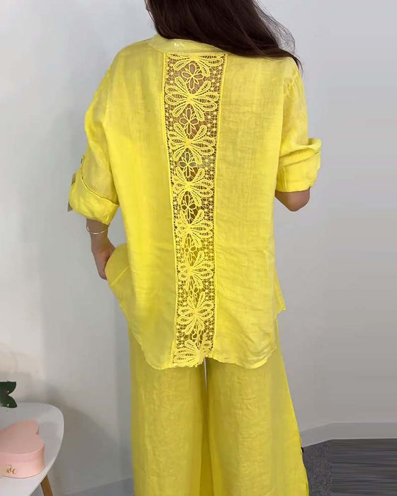 Koronkowa bluzka z kieszeniami i spodnie z szerokimi nogawkami w jednolitym kolorze