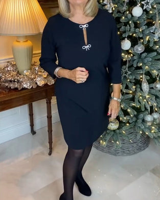 Prosta sukienka w jednolitym kolorze z okrągłym dekoltem