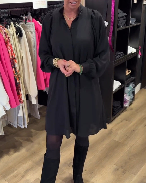 Sukienka z dekoltem w kształcie litery V i długością do kolan