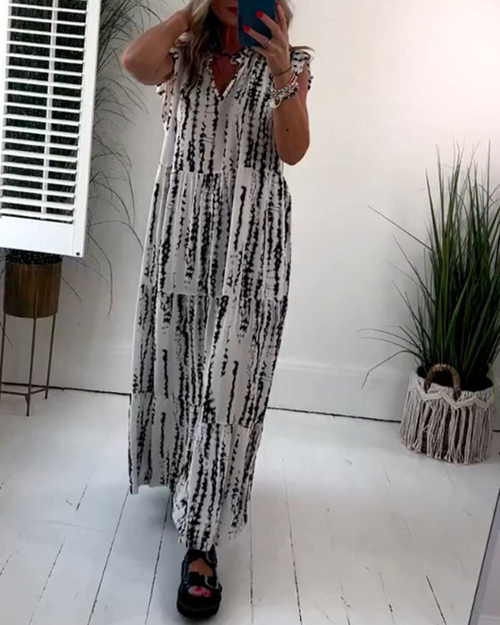 Sukienka z dekoltem w serek i nadrukiem