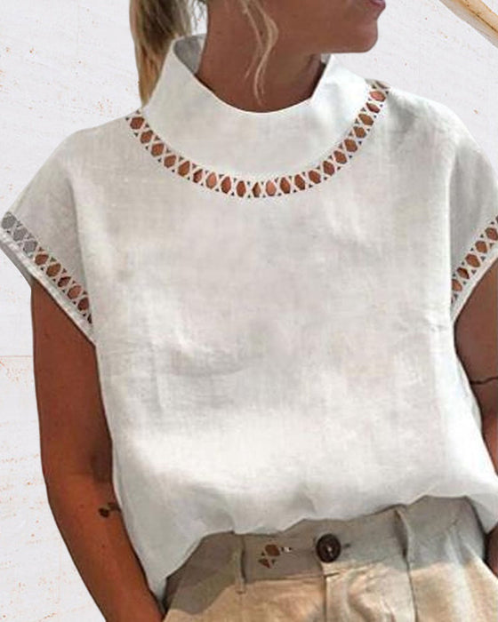 Bluzka ze stójką z koronki w jednolitym kolorze