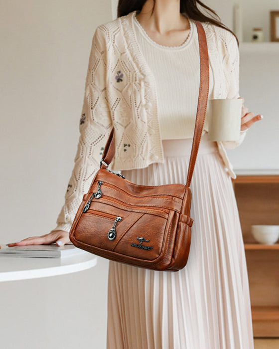Wielokieszeniowa miękka skórzana torebka na ramię (crossbody)