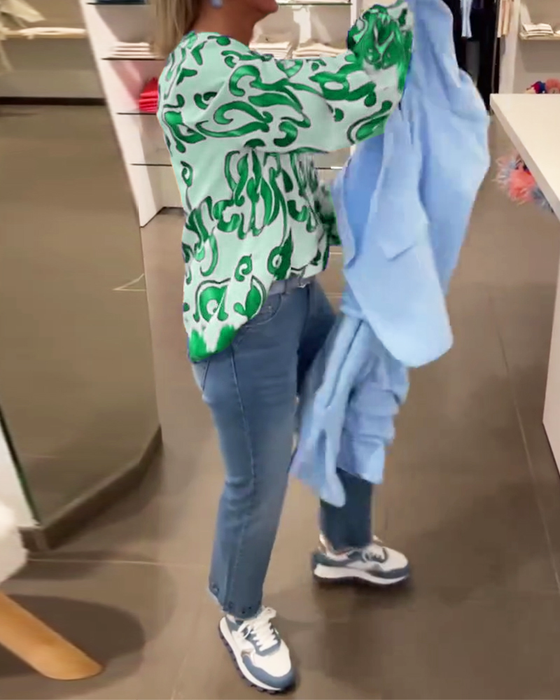 Elegancka bluzka z długim rękawem i dekoltem w kształcie litery V