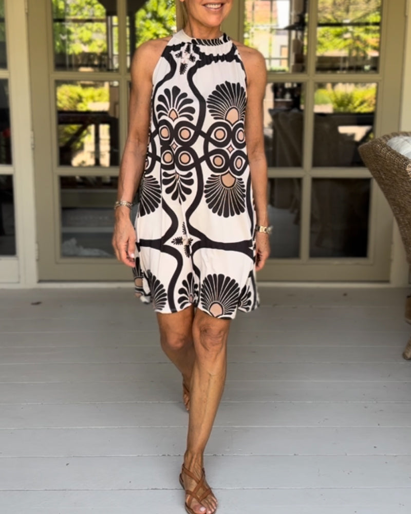 Sukienka z dekoltem i nadrukiem w stylu vintage