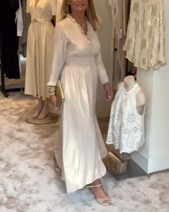 Długa sukienka zapinana na guziki z koronkowym kołnierzykiem