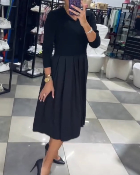 Plisowana sukienka z dekoltem w kształcie litery V