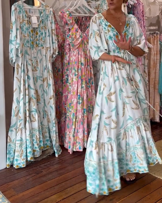 Damska sukienka maxi z dekoltem w kształcie litery V i nadrukiem w liście