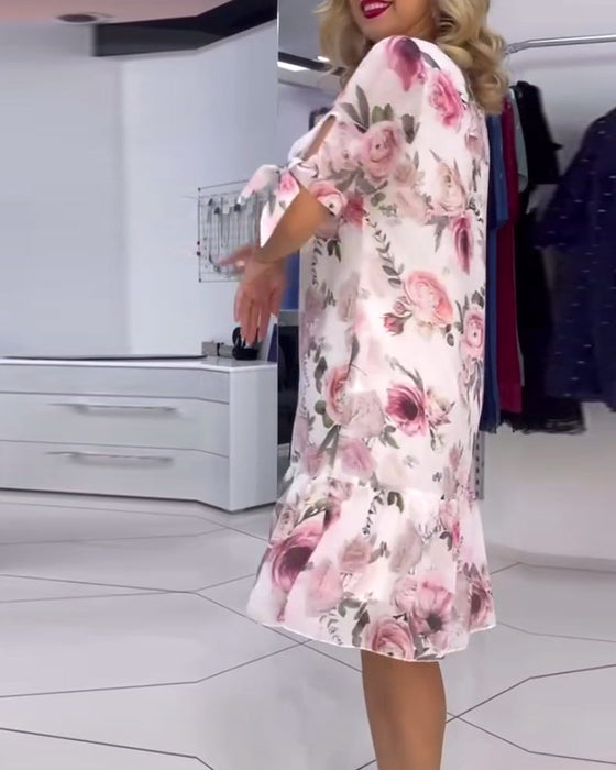 Elegancka sukienka w kwiaty z okrągłym dekoltem