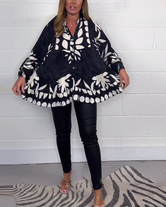 Bluzka z nadrukiem zapinana na guziki z rękawami dzwonkowymi