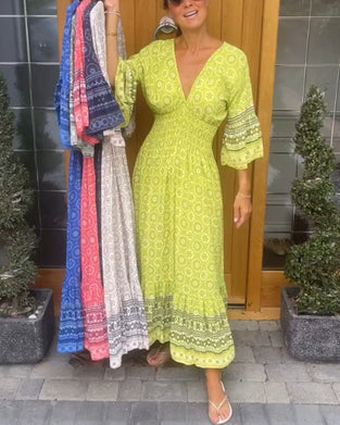 Długa sukienka z długim rękawem w kształcie litery V