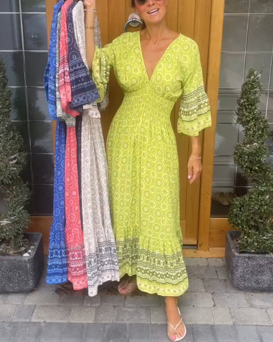 Długa sukienka z długim rękawem w kształcie litery V