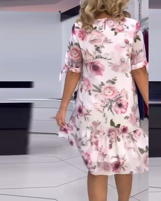 Elegancka sukienka w kwiaty z okrągłym dekoltem