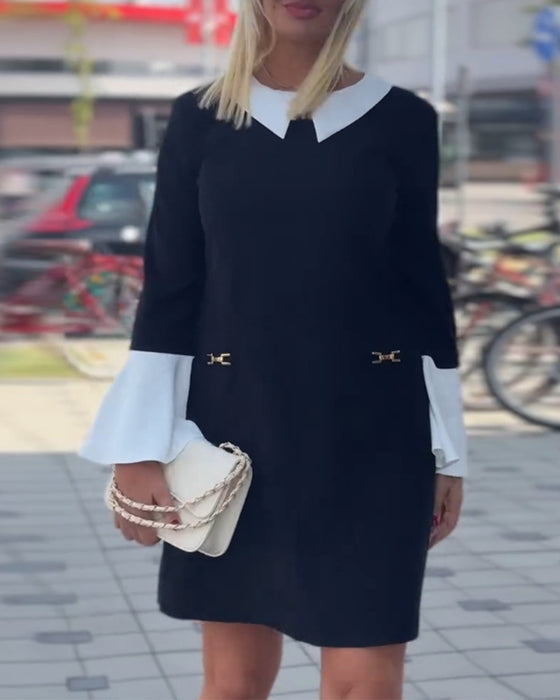 Elegancka kontrastująca sukienka z rękawami dzwonkowymi
