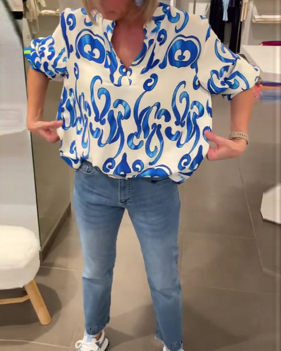 Elegancka bluzka z długim rękawem i dekoltem w kształcie litery V