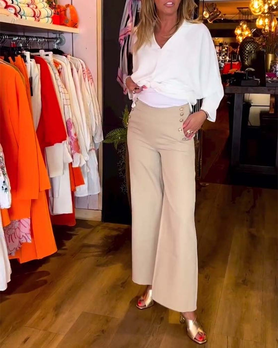 Wiązana bluzka z dekoltem w szpic