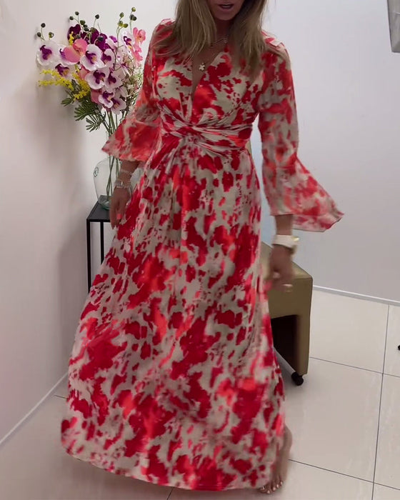 Modna dzianinowa sukienka z głębokim dekoltem w kształcie litery V i nadrukiem