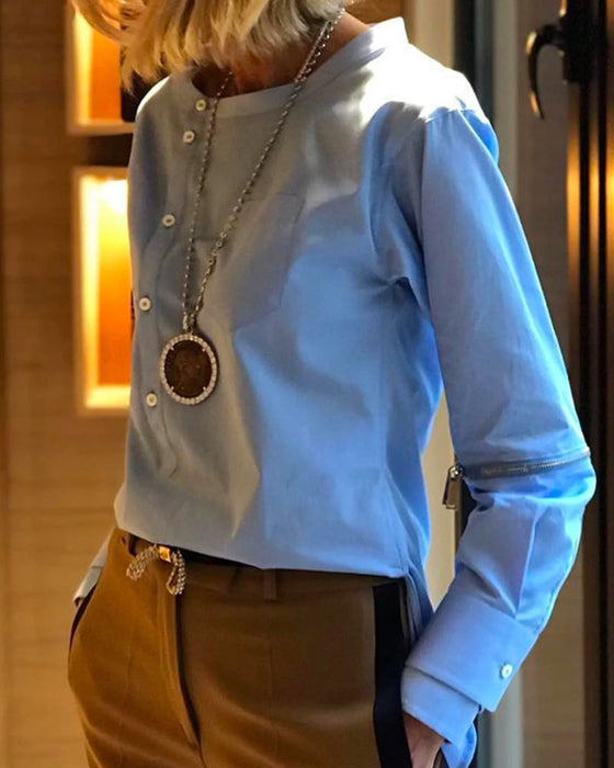 Bluzka zapinany na guziki w jednolitym kolorze