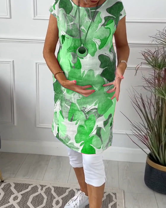 Długa bluzka w kolorowe kwiatowe wzory