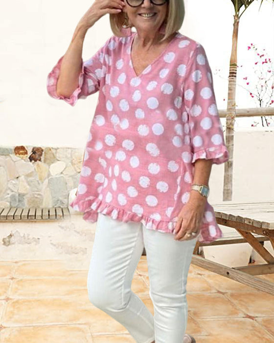 Topy z nadrukiem w kropki i dekoltem V