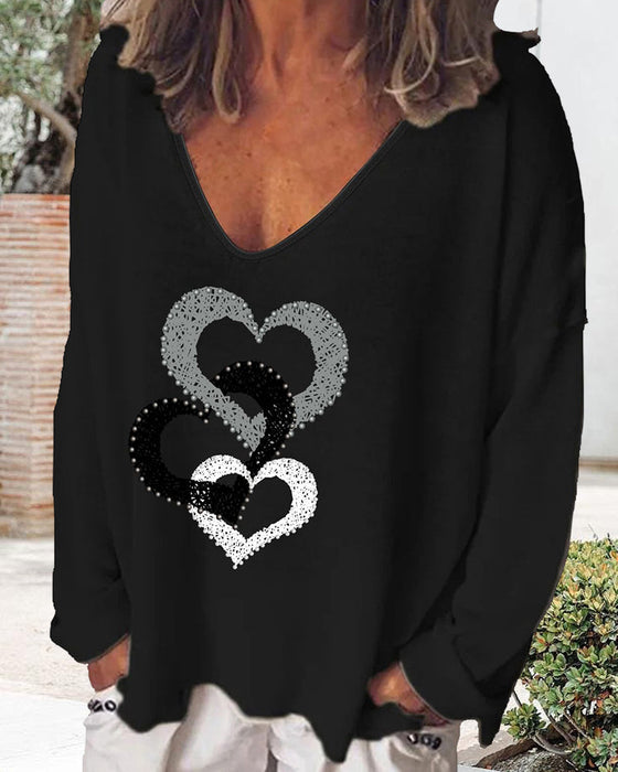Bluzka z długim rękawem i nadrukiem serca