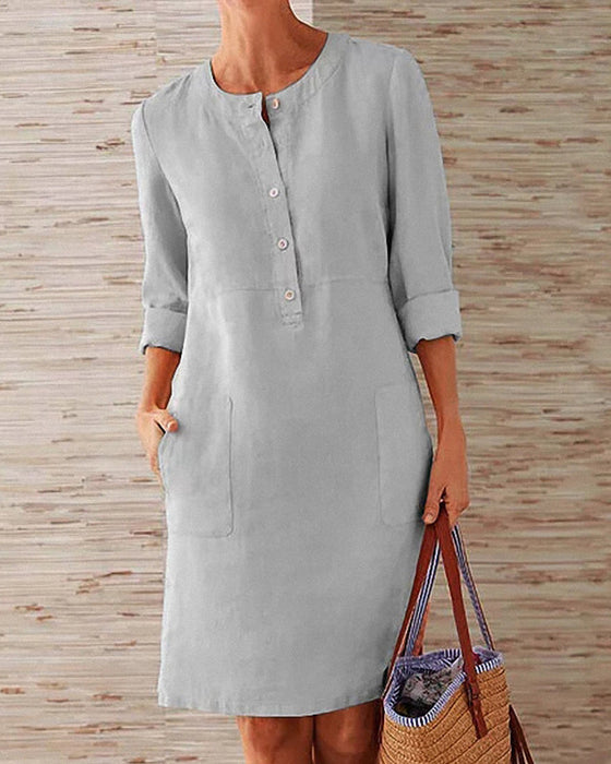 Jednolita sukienka do kolan z okrągłym dekoltem