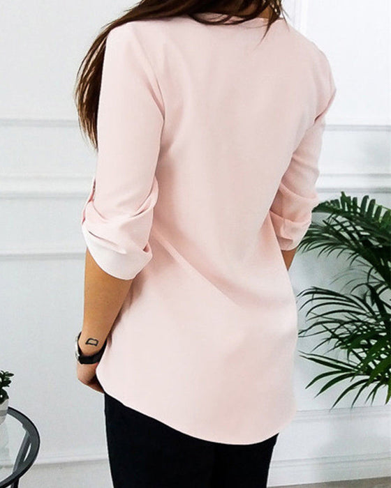 Solidna bluzka zapinana na zamek