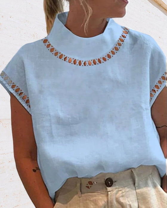 Bluzka ze stójką z koronki w jednolitym kolorze